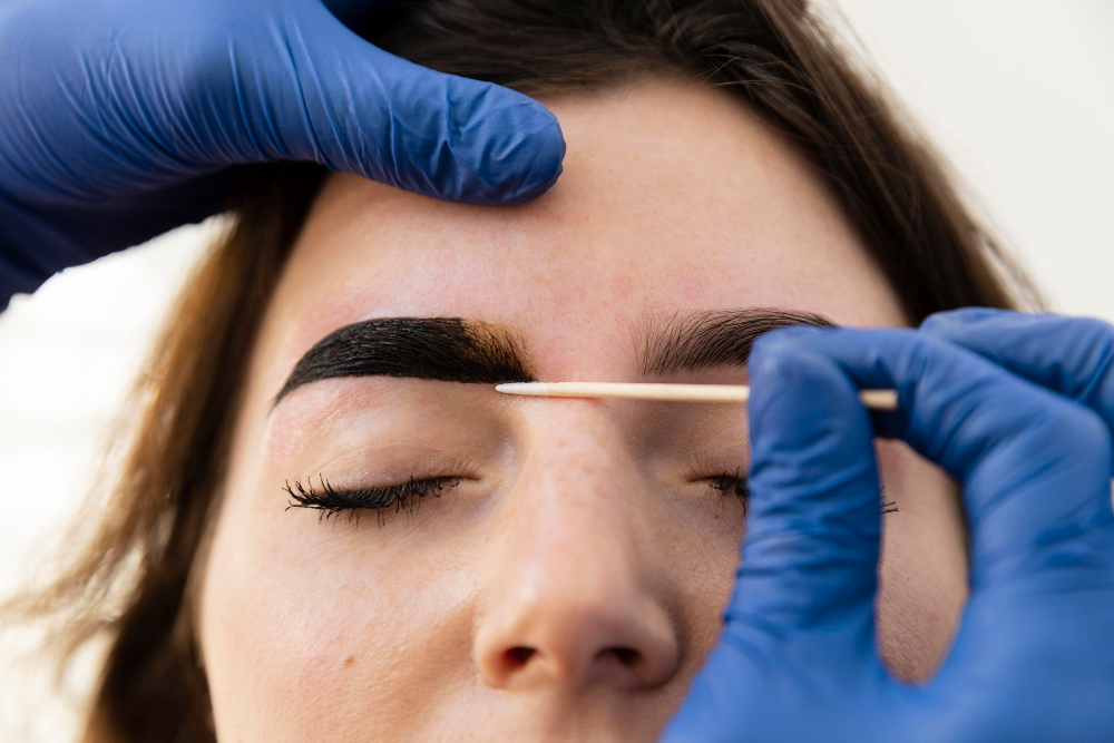 master-gently-doing-eyebrow-procedure-pretty-female-model_231208-3531 Professional eyebrow lamination in Torrance, California